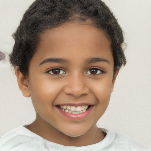 Joyful white child female with short  brown hair and brown eyes