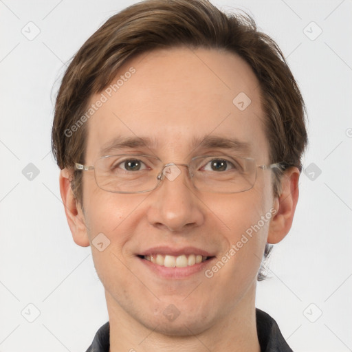 Joyful white adult male with short  brown hair and grey eyes