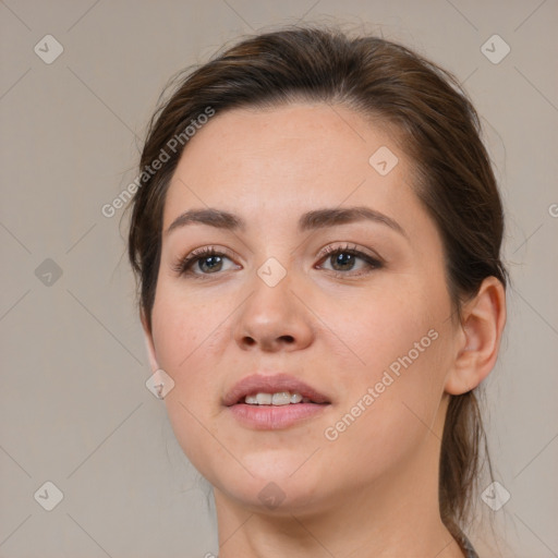 Neutral white young-adult female with medium  brown hair and brown eyes