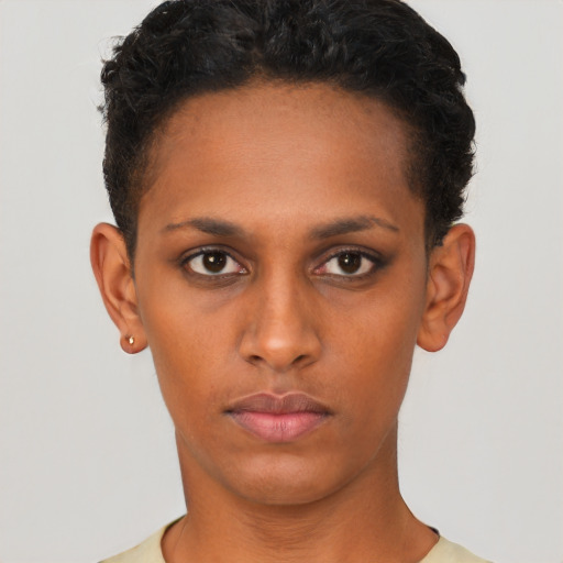 Neutral black young-adult female with short  brown hair and brown eyes