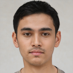 Neutral asian young-adult male with short  black hair and brown eyes