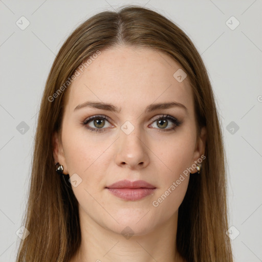 Neutral white young-adult female with long  brown hair and green eyes