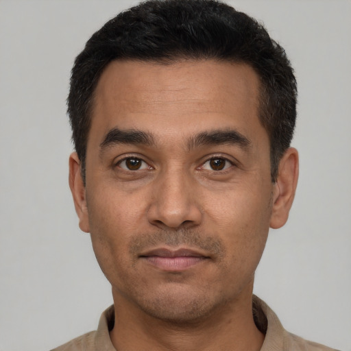 Neutral white young-adult male with short  black hair and brown eyes
