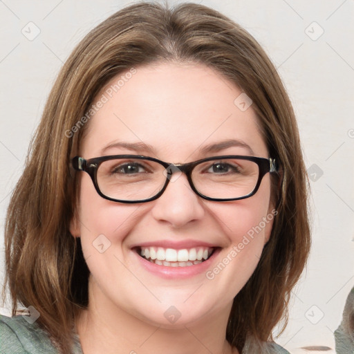 Joyful white young-adult female with medium  brown hair and blue eyes