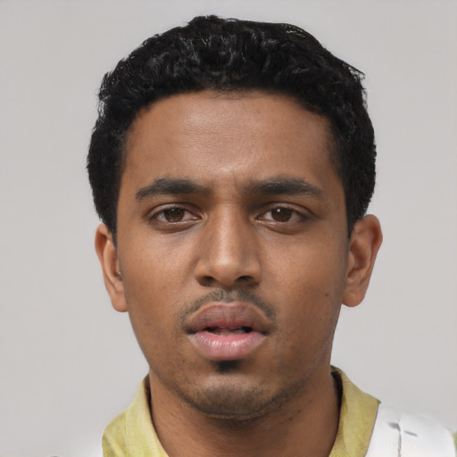 Neutral latino young-adult male with short  black hair and brown eyes