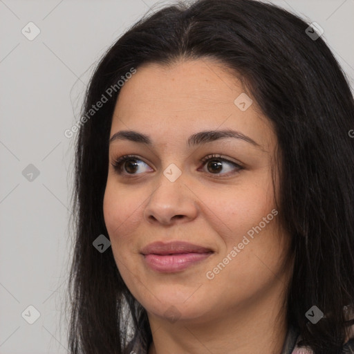 Joyful asian young-adult female with long  brown hair and brown eyes