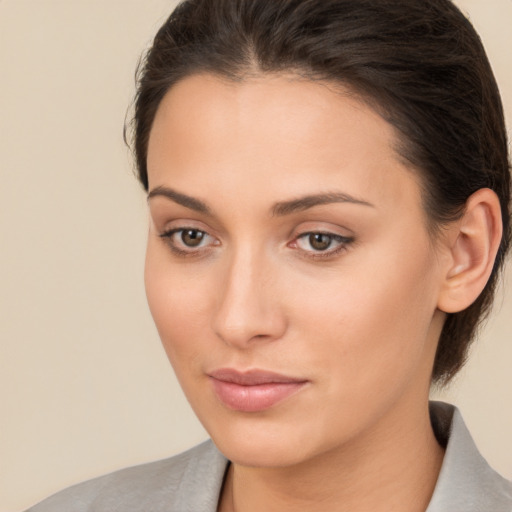 Neutral white young-adult female with medium  brown hair and brown eyes