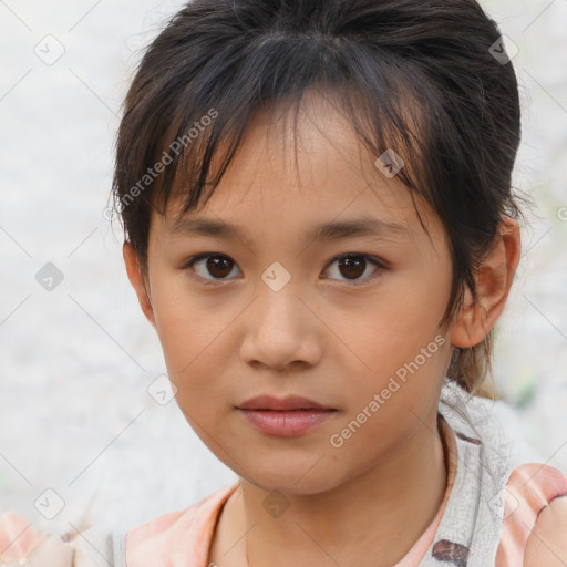 Joyful asian child female with medium  brown hair and brown eyes