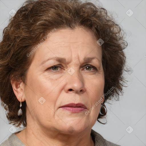 Joyful white middle-aged female with medium  brown hair and grey eyes