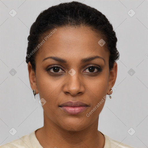 Joyful black young-adult female with short  black hair and brown eyes