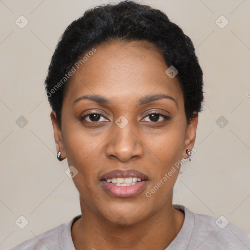 Joyful black young-adult female with short  black hair and brown eyes