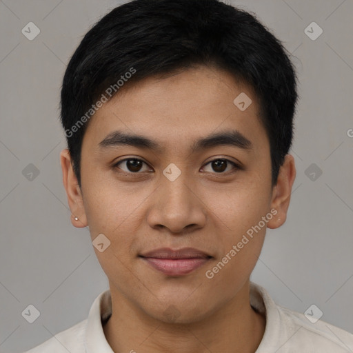 Joyful latino young-adult male with short  black hair and brown eyes