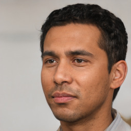 Neutral white young-adult male with short  black hair and brown eyes
