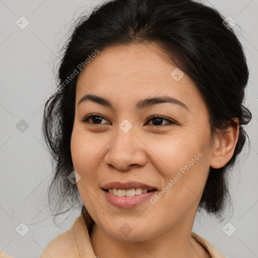 Joyful asian young-adult female with medium  brown hair and brown eyes