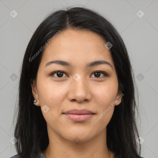 Joyful latino young-adult female with long  brown hair and brown eyes