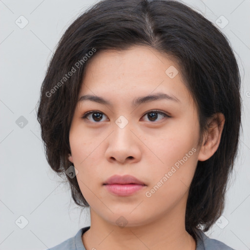 Neutral asian young-adult female with medium  brown hair and brown eyes