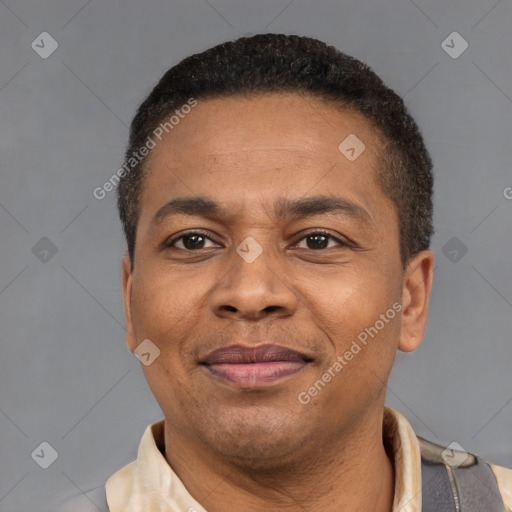 Joyful latino adult male with short  brown hair and brown eyes