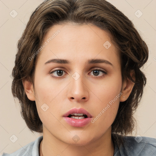 Neutral white young-adult female with medium  brown hair and brown eyes