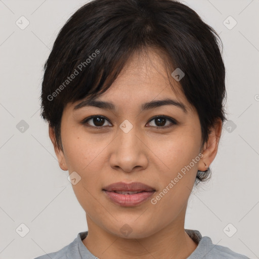 Joyful asian young-adult female with short  brown hair and brown eyes