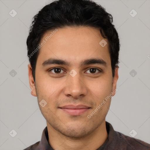 Joyful white young-adult male with short  black hair and brown eyes