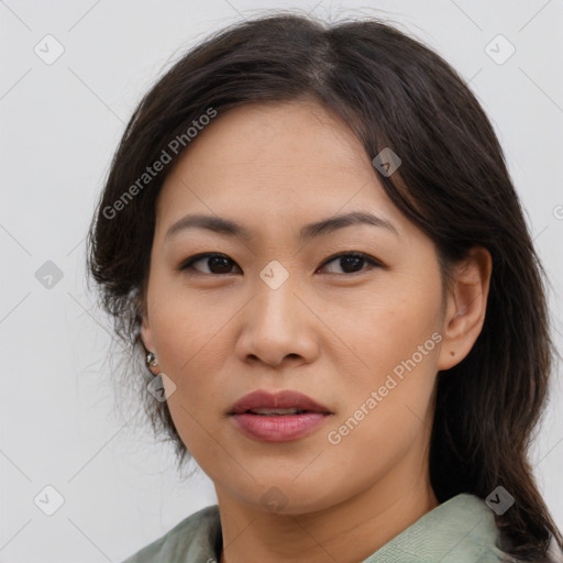 Joyful asian young-adult female with medium  brown hair and brown eyes