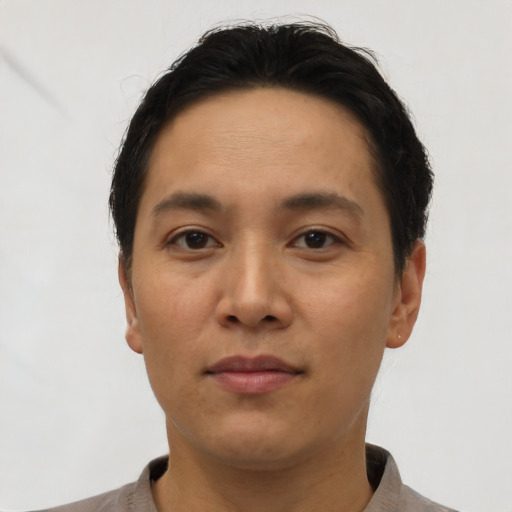 Neutral asian adult male with short  black hair and brown eyes