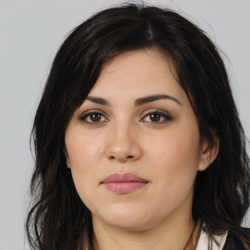 Neutral white young-adult female with long  black hair and brown eyes