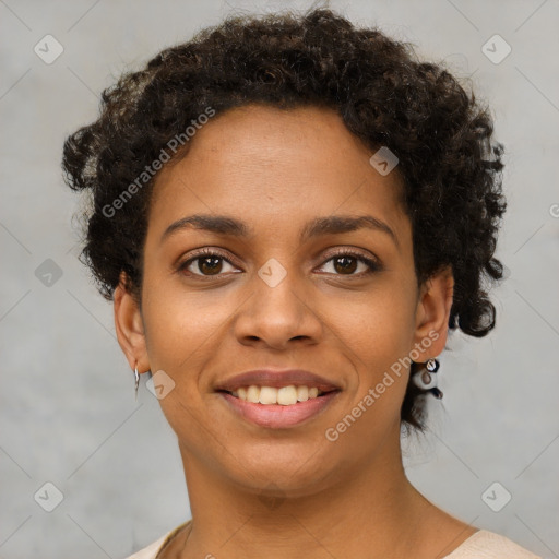 Joyful black young-adult female with short  brown hair and brown eyes