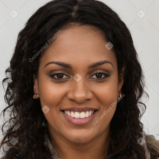 Joyful black young-adult female with long  brown hair and brown eyes