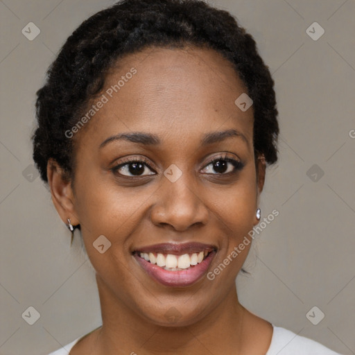 Joyful latino young-adult female with short  brown hair and brown eyes