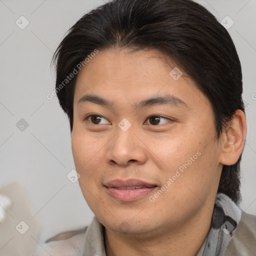 Joyful asian young-adult female with medium  brown hair and brown eyes