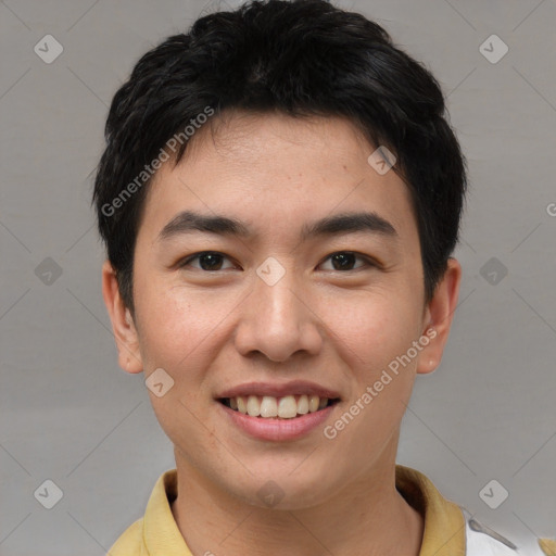 Joyful asian young-adult male with short  brown hair and brown eyes