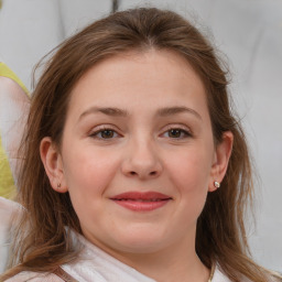 Joyful white child female with medium  brown hair and brown eyes