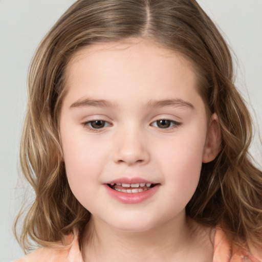 Joyful white child female with medium  brown hair and brown eyes