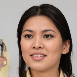 Joyful asian young-adult female with medium  brown hair and brown eyes