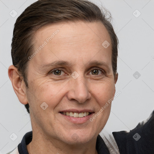 Joyful white adult male with short  brown hair and grey eyes