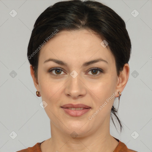 Joyful white young-adult female with medium  brown hair and brown eyes