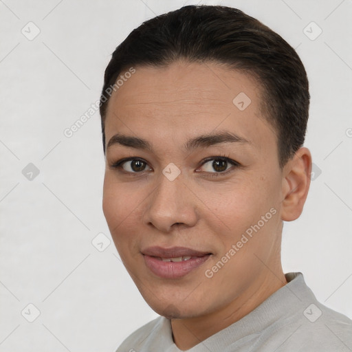 Joyful white young-adult female with short  brown hair and brown eyes