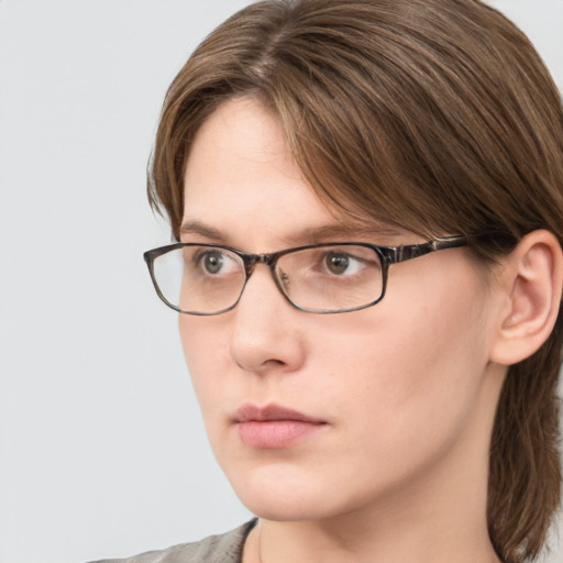 Neutral white young-adult female with medium  brown hair and blue eyes