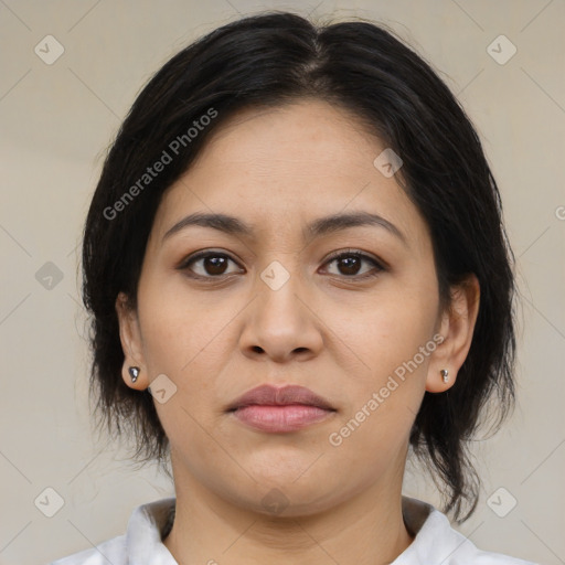 Joyful latino young-adult female with medium  brown hair and brown eyes