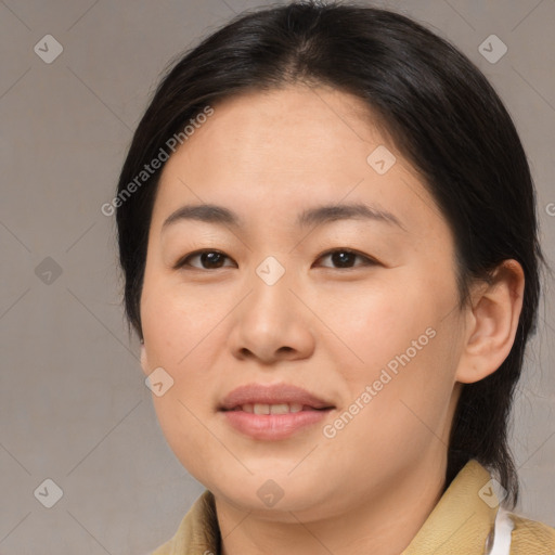 Joyful asian young-adult female with medium  brown hair and brown eyes