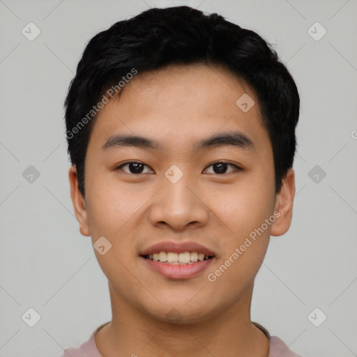 Joyful asian young-adult male with short  black hair and brown eyes