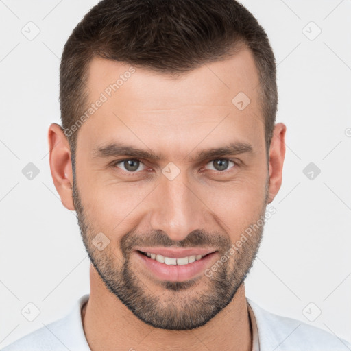 Joyful white young-adult male with short  brown hair and brown eyes