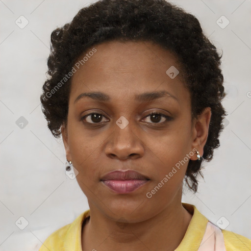 Neutral black young-adult female with short  brown hair and brown eyes