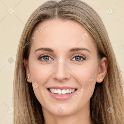 Joyful white young-adult female with long  brown hair and grey eyes