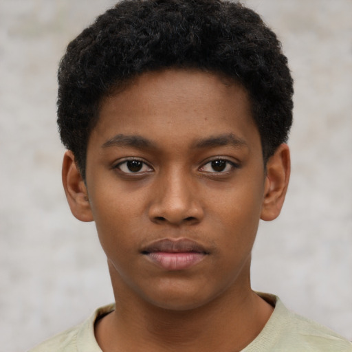 Neutral black child male with short  black hair and brown eyes