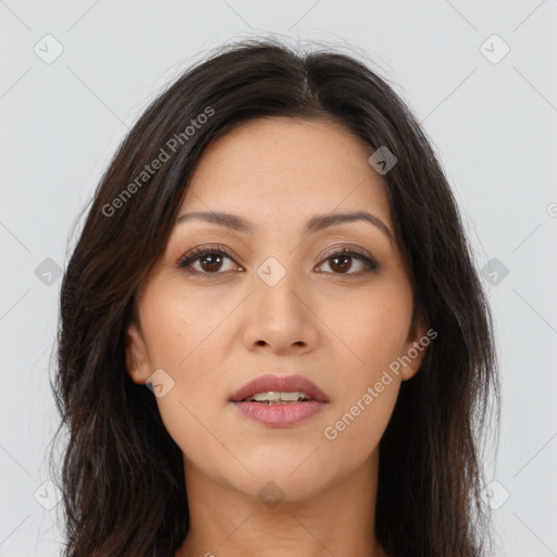 Joyful asian young-adult female with long  brown hair and brown eyes