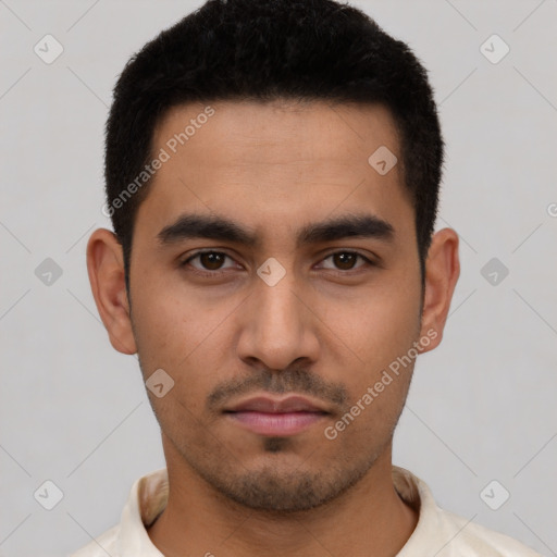 Neutral latino young-adult male with short  black hair and brown eyes