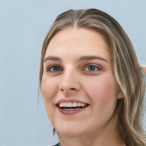 Joyful white young-adult female with long  brown hair and blue eyes