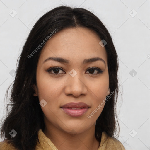 Joyful latino young-adult female with long  brown hair and brown eyes